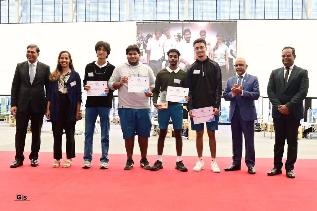 Students presenting science projects at a school fair